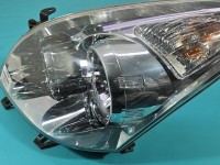 Reflektor lewy lampa przód Toyota Corolla Verso II EUROPA