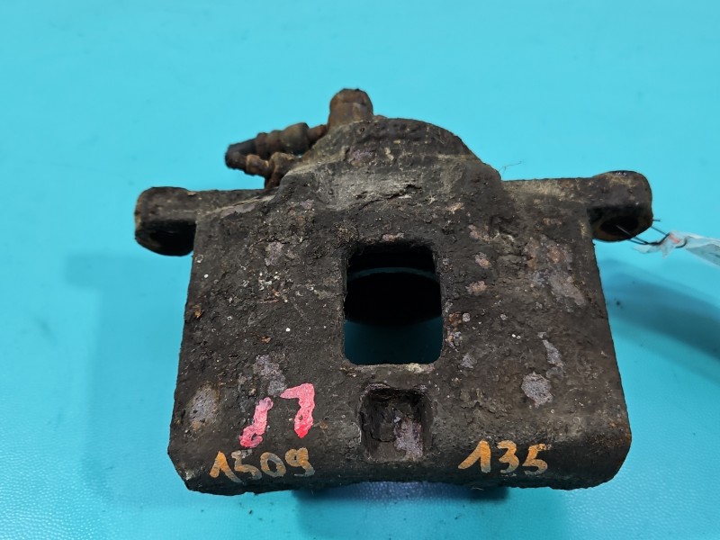 Zacisk przód lewy Opel Monterey 3.2 24V