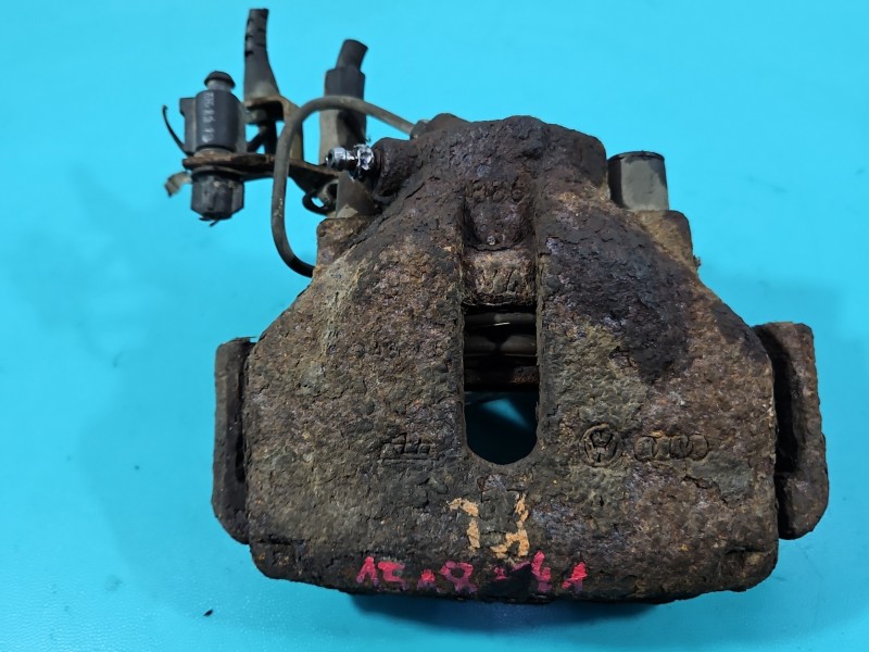 Zacisk przód lewy Vw Passat B5 1.9 TDI