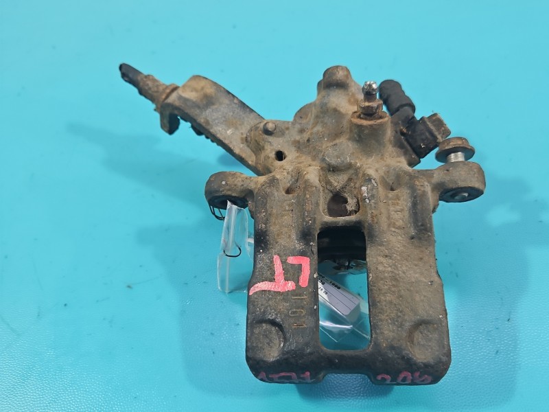 Zacisk tył lewy Nissan Primera P10 sedan 2.0 16V