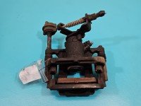 Zacisk tył lewy Opel Astra IV J 1.6 16v HB