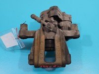 Zacisk tył lewy Vw Caddy IV 2.0 tdi HB