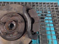 Zacisk przód prawy Opel Astra IV J 1.6 16V