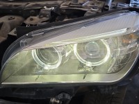 Reflektor lewy lampa przód BMW X1 E84 EUROPA 90018090, 7290239