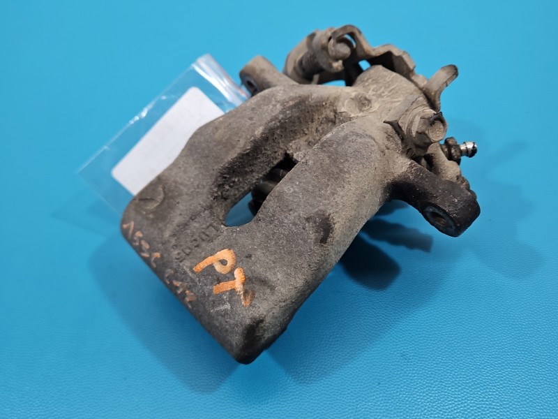 Zacisk tył prawy Opel Astra III H 1.9 cdti kombi