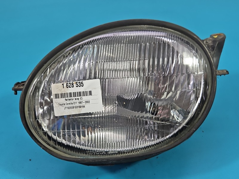 Reflektor lewy lampa przód Toyota Corolla E11 EUROPA
