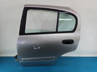 Drzwi tył lewe Nissan Almera N16 HB 5d srebrny
