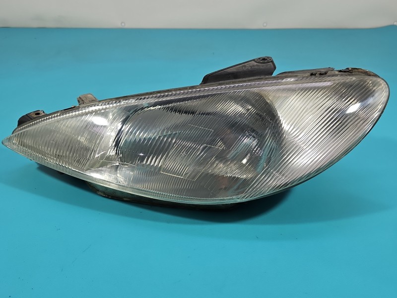 Reflektor lewy lampa przód Peugeot 206 EUROPA 9640559580