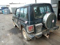 Zamek klapy tył Mitsubishi Pajero HB