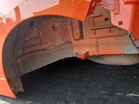 Błotnik tył lewy Opel Corsa F ćwiartka pomarańczowy KVH