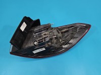 Lampa tył lewa Opel Astra V K kombi EUROPA 39077374, 368158932