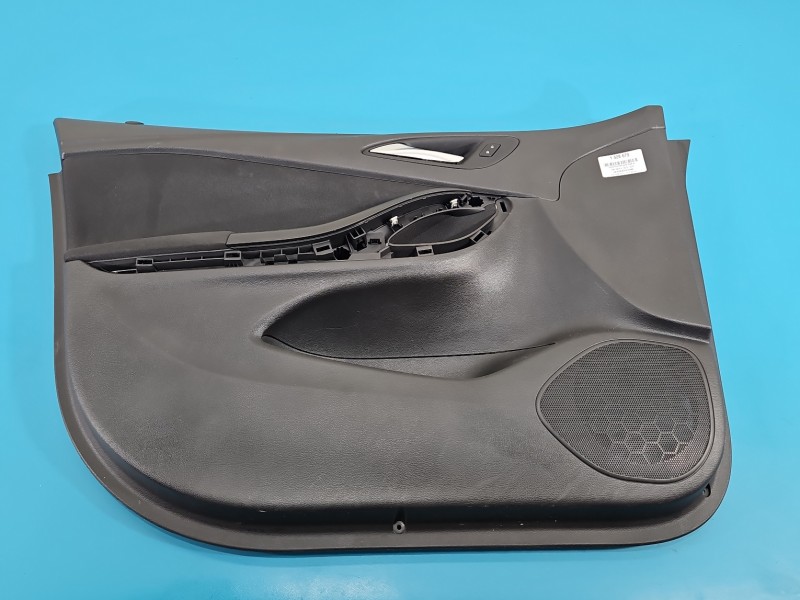 Tapicerka drzwi przód lewa boczek Opel Astra V K 2513829