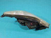 Reflektor lewy lampa przód Opel Corsa D EUROPA