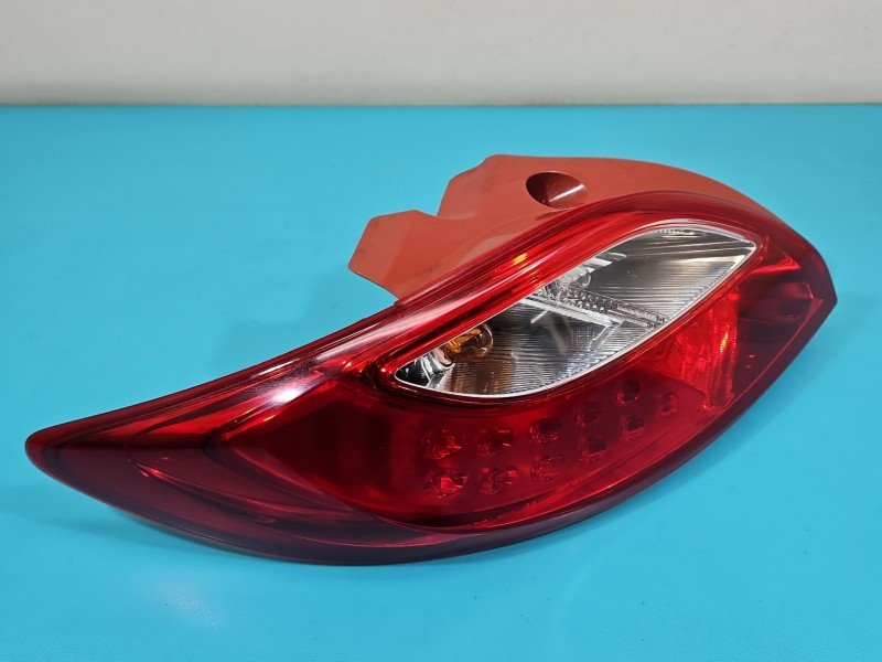 Lampa tył lewa Producent części: Mazda, STANLEY 07-10 Mazda 2 II DE HB