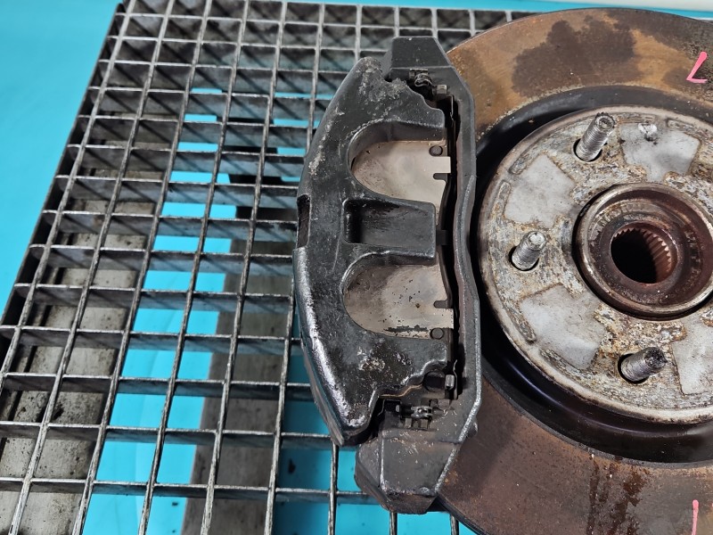 Zacisk przód lewy Fiat Freemont 2.0 jtd