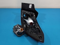 Lampa tył lewa Opel Astra V K kombi EUROPA 39077374