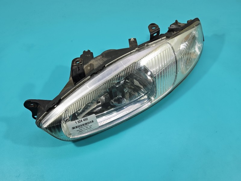 Reflektor lewy lampa przód Mitsubishi Colt 96-04 EUROPA