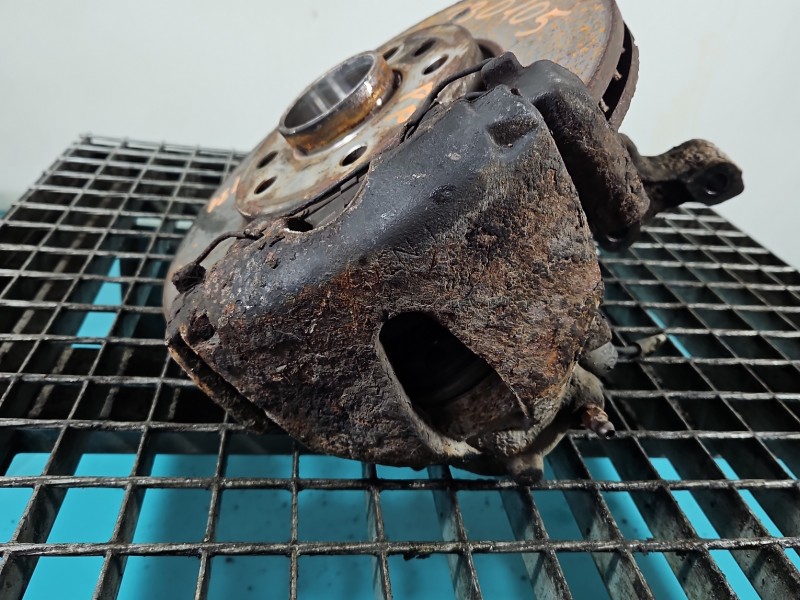 Zacisk przód prawy Opel Astra III H 1.7 cdti