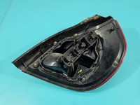 Lampa tył lewa Nissan Almera N16 HB lekko nadpalony otwór na żarówkę porysowana Z LISTWĄ ŻARÓWKOWĄ 00-03 PRZED LIFTEM...