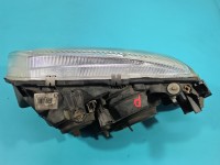 Reflektor prawy lampa przód Nissan Almera N16 EUROPA 89003330