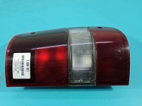 Lampa tył lewa Producent części: OPEL, Ichikoh, pęknięty klosz wewnątrz, rysy Opel Monterey HB