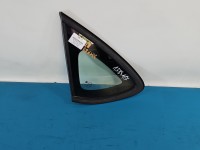Szyba karoseryjna tył lewa Opel Astra IV J sedan