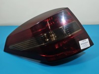 Lampa tył lewa Z BŁOTNIKA obklejona folią Renault Laguna III kombi