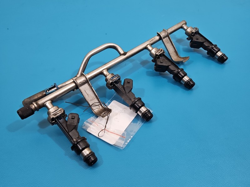 Wtryskiwacz Opel Astra III H 25343299 1.6 16V