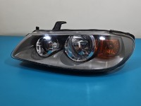 Reflektor lewy lampa przód Nissan Almera N16 EUROPA