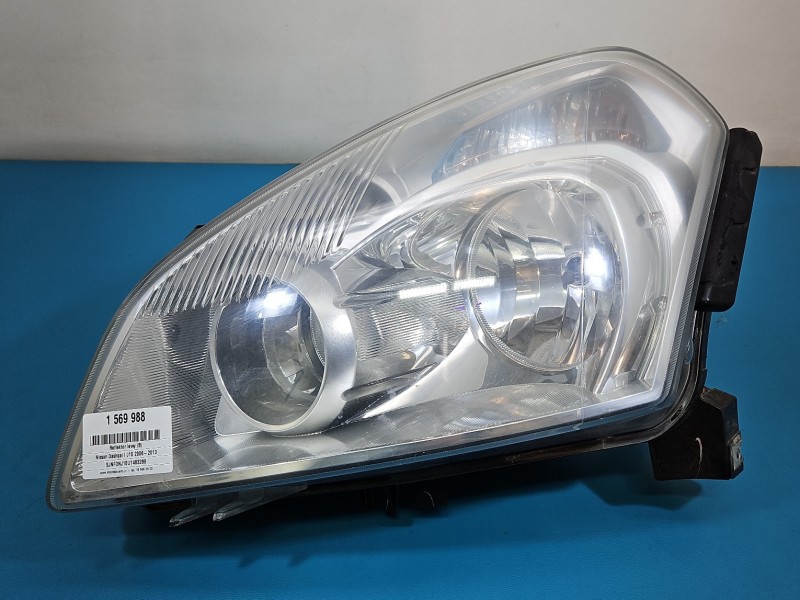 Reflektor lewy lampa przód Nissan Qashqai I J10 06-13 EUROPA 26060-JD90B