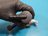 Spryskiwacz reflektora prawy Opel Zafira B