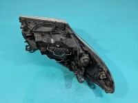 Reflektor lewy lampa przód Renault Megane III EUROPA 260600017R