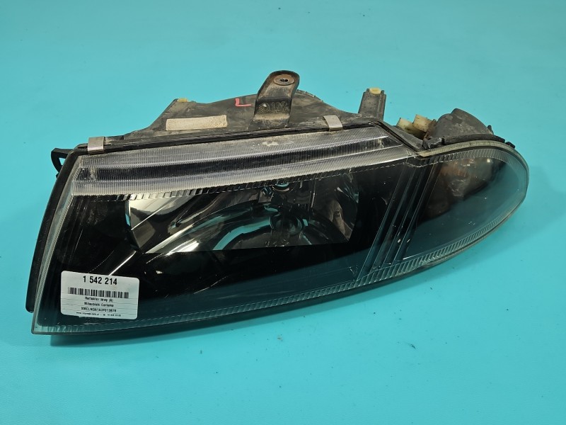 Reflektor lewy lampa przód Mitsubishi Carisma EUROPA