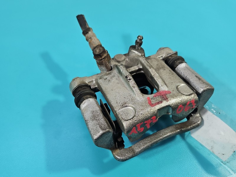 Zacisk tył lewy Toyota Corolla E12 kombi 2.0 D4D