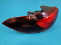 Lampa tył lewa Opel Astra V K kombi Pęknięte mocowanie trzymający wkład VALEO KOMBI W BŁOTNIK EUROPA