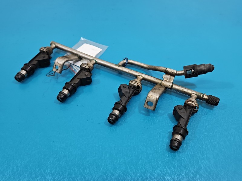 Wtryskiwacz listwa wtryskowa 25343299 Opel Astra III H 1.6 16V 105KM