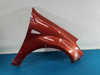 Błotnik przód prawy Dacia Sandero I 08-12 bordowy TEB76