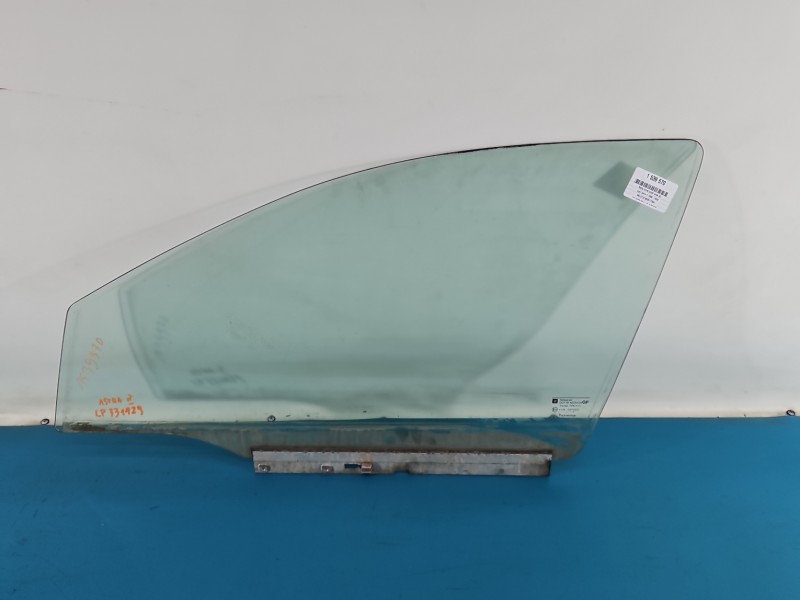 Szyba drzwi przód lewa Opel Astra II G HB