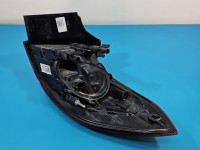 Lampa tył lewa Opel Astra V K kombi Pęknięte mocowanie trzymający wkład VALEO KOMBI W BŁOTNIK EUROPA