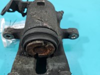 Zacisk tył lewy Opel Zafira B 1.9 cdti HB