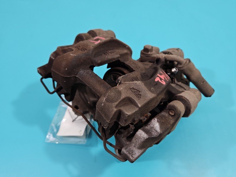 Zacisk tył lewy Vw Tiguan II 16- 1.5 TSI HB