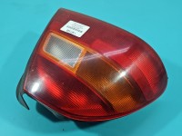 Lampa tył lewa Producent części: Honda, hatchback 5d 95-97 Z LISTWĄ ŻARÓWKOWĄ Honda Civic VI HB