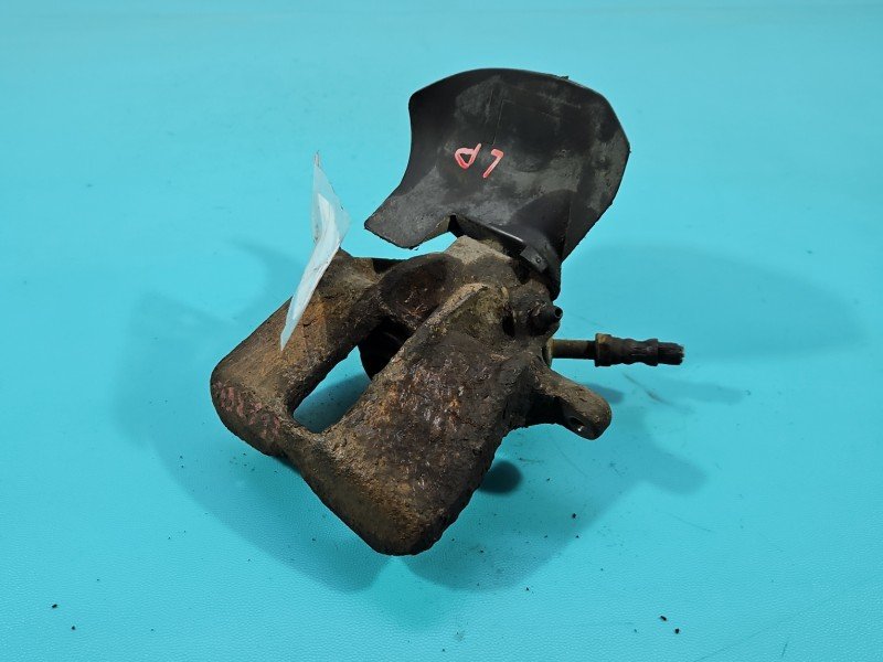 Zacisk przód lewy Vw Golf III 1.8 jedn