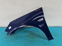 Błotnik przód lewy Opel Astra V K granatowy Y23A
