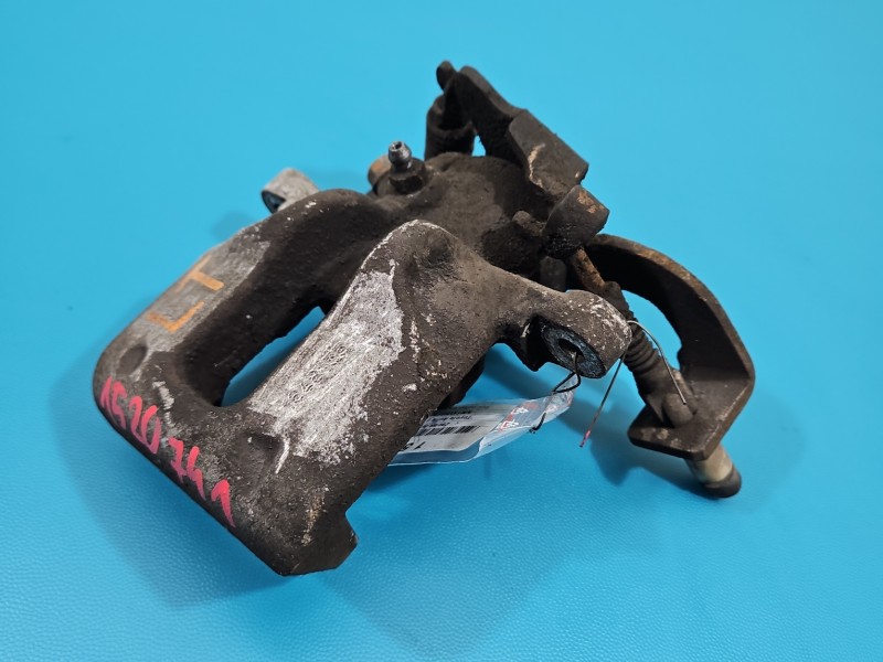 Zacisk tył lewy Toyota Auris I 1.6 VVTI HB