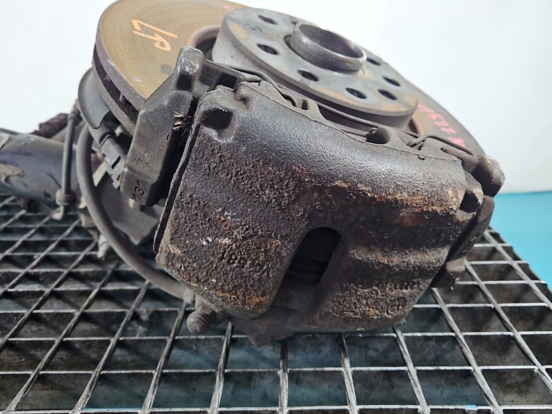 Zacisk przód lewy Vw Passat B7 2.0 TSI