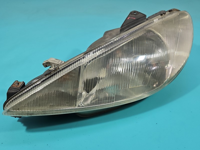 Reflektor lewy lampa przód Peugeot 206 EUROPA 9640559580