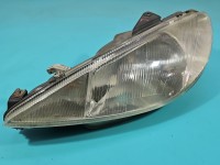 Reflektor lewy lampa przód Peugeot 206 EUROPA 9640559580
