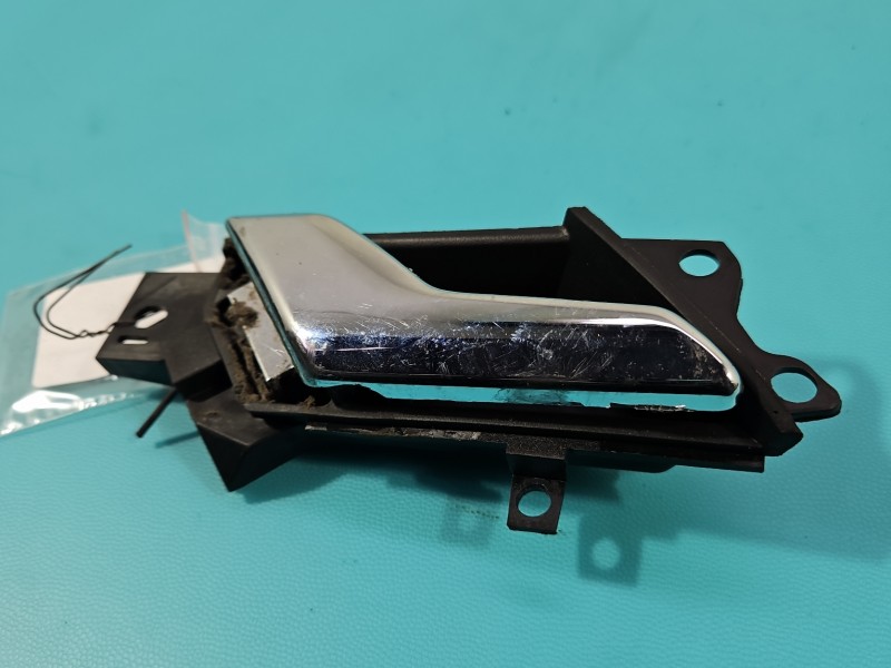 Klamka wewnętrzna tył lewa Opel Antara 96660863