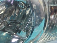 Reflektor lewy lampa przód Kia Carnival I EUROPA